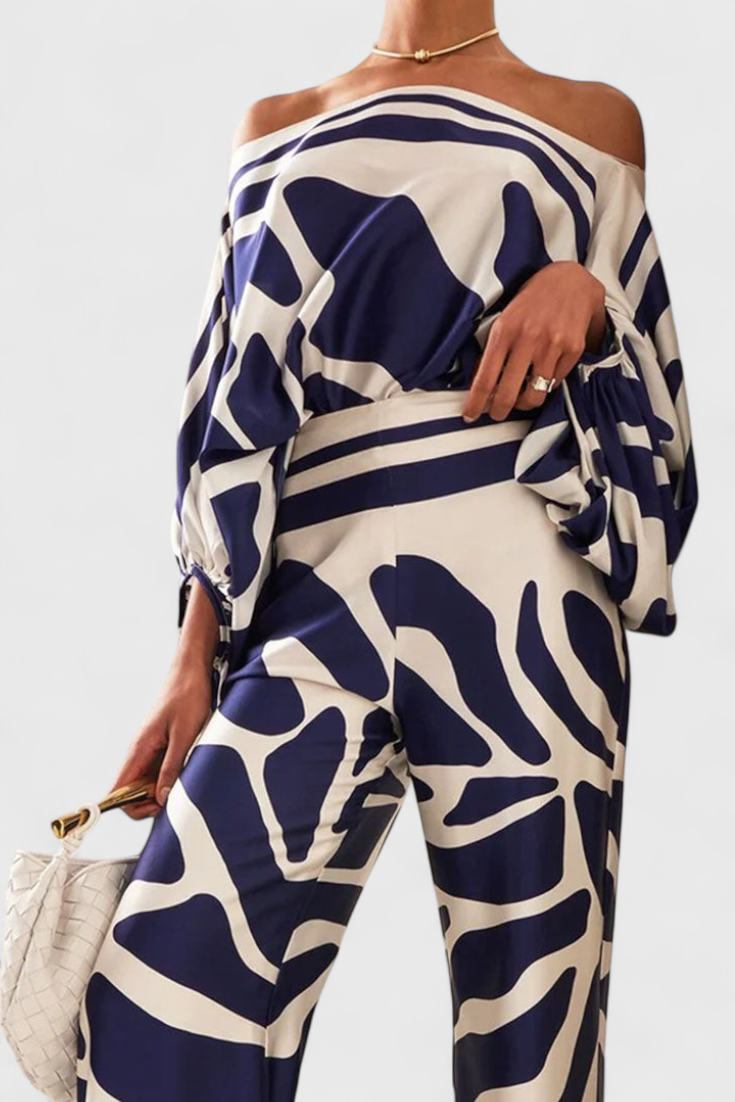 Sybella Conjunto de Dos Piezas con Hombros al Descubierto y Pantalones Amplios Estampados