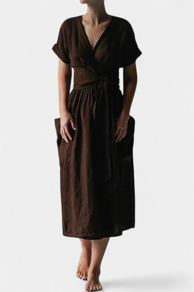 "Cressida Vestido de Algodón con Escote en V y Cintura Ajustable" can be rewritten as: "Vestido de Algodón Cressida con Escote en V y Cintura Ajustable".