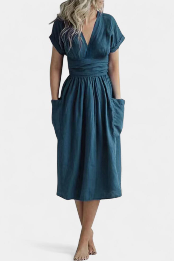 "Cressida Vestido de Algodón con Escote en V y Cintura Ajustable" can be rewritten as: "Vestido de Algodón Cressida con Escote en V y Cintura Ajustable".
