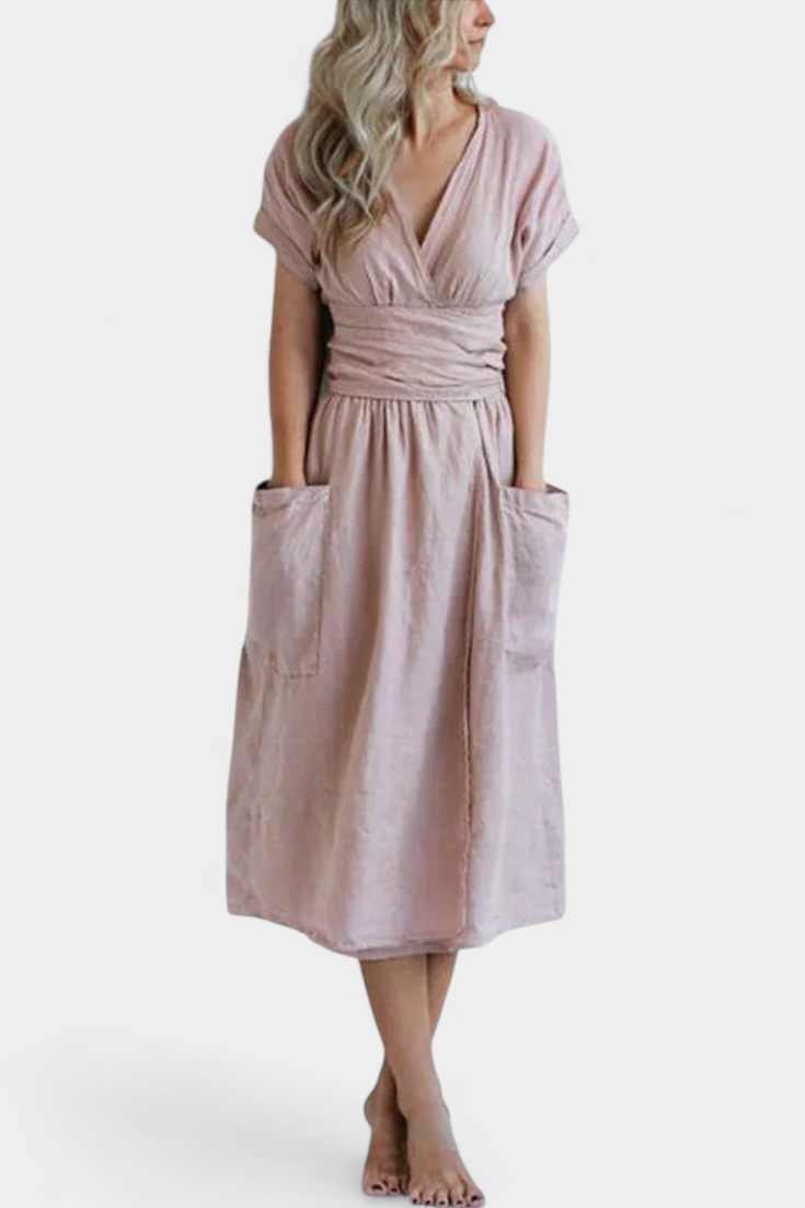 "Cressida Vestido de Algodón con Escote en V y Cintura Ajustable" can be rewritten as: "Vestido de Algodón Cressida con Escote en V y Cintura Ajustable".