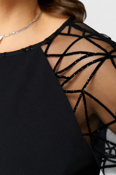 Vestido Negro Bellezza con Mangas de Malla y Corte Suelto