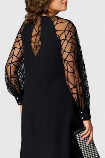Vestido Negro Bellezza con Mangas de Malla y Corte Suelto