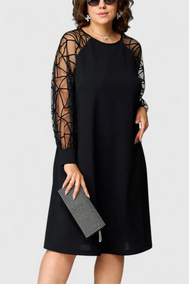 Vestido Negro Bellezza con Mangas de Malla y Corte Suelto