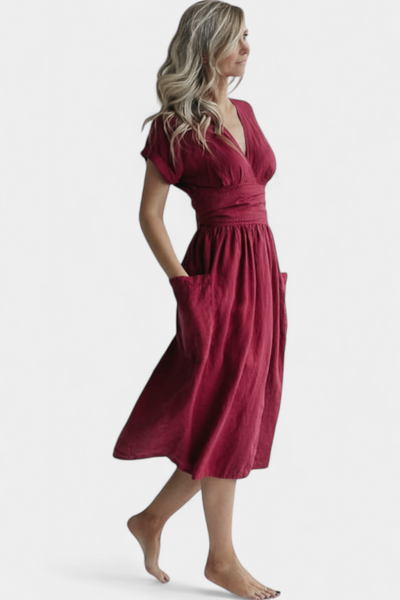 "Cressida Vestido de Algodón con Escote en V y Cintura Ajustable" can be rewritten as: "Vestido de Algodón Cressida con Escote en V y Cintura Ajustable".
