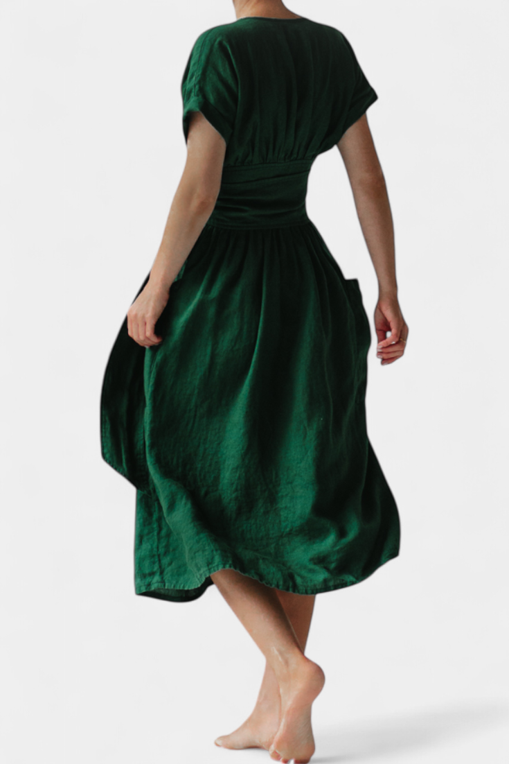 "Cressida Vestido de Algodón con Escote en V y Cintura Ajustable" can be rewritten as: "Vestido de Algodón Cressida con Escote en V y Cintura Ajustable".